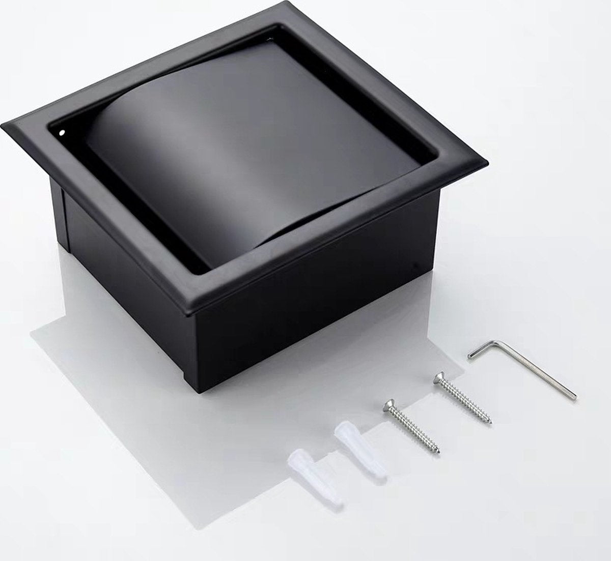 Toilet roll loaded into the black stainless steel built in holder