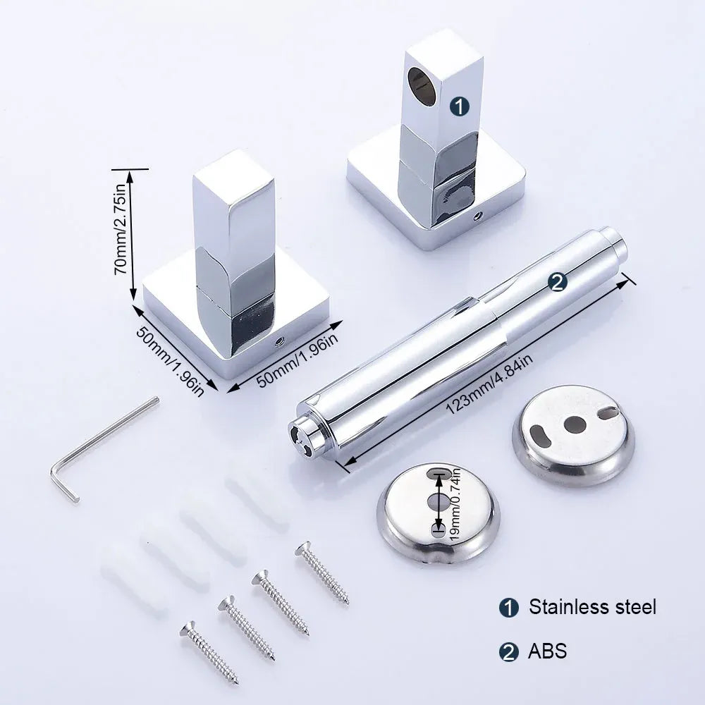 Square chrome toilet paper holder loaded with a standard roll