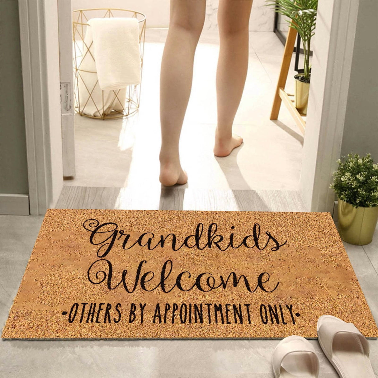 Floral print door mat with blue flowers on a brown ground