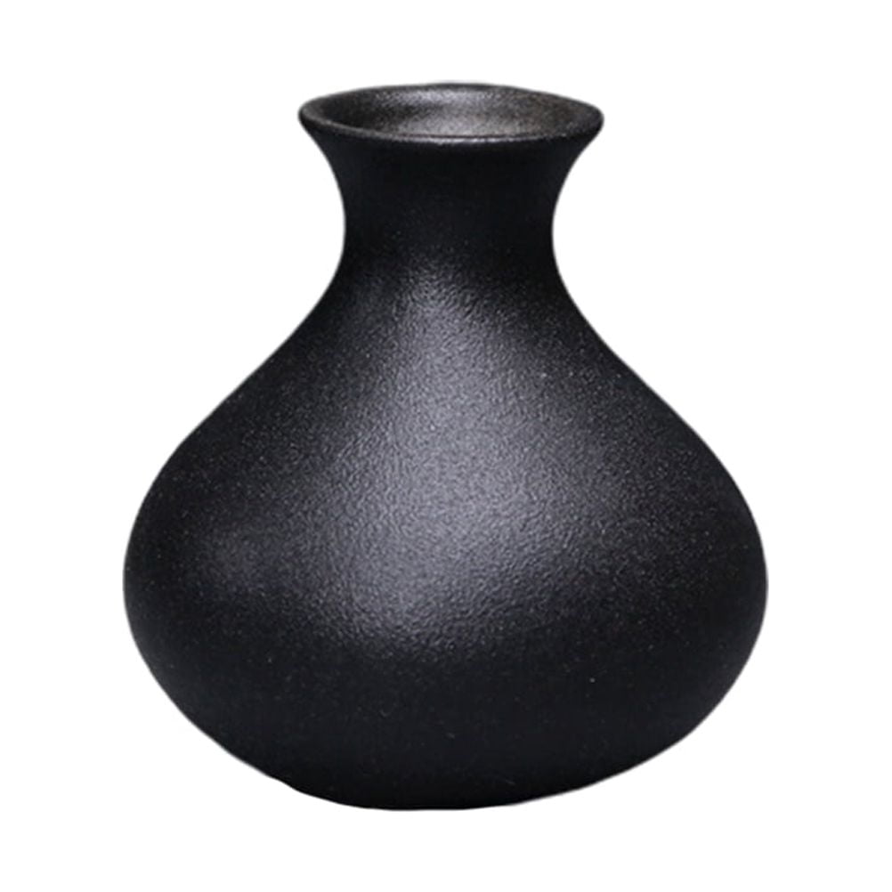 Compact black ceramic table vase with a matte finish