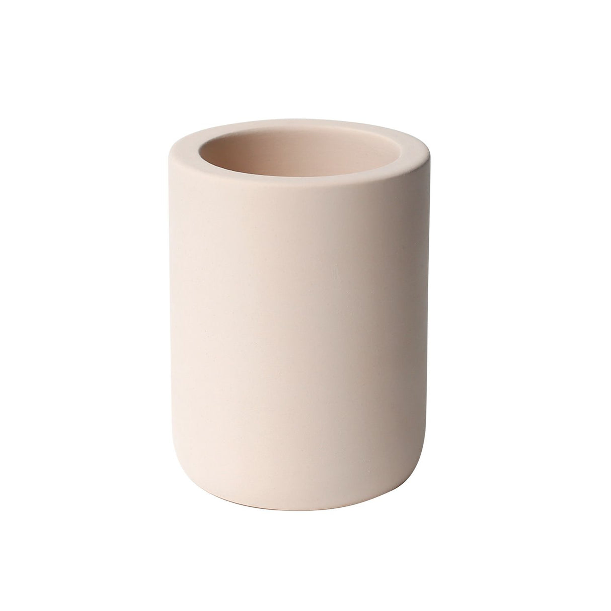 Beige diatomaceous earth drying stone toothbrush holder standing on a bathroom bench