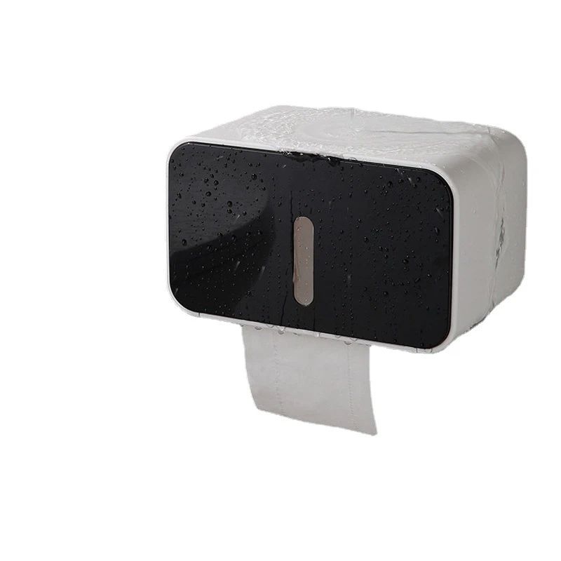 Black enclosed toilet paper holder with full cover mounted on a wall
