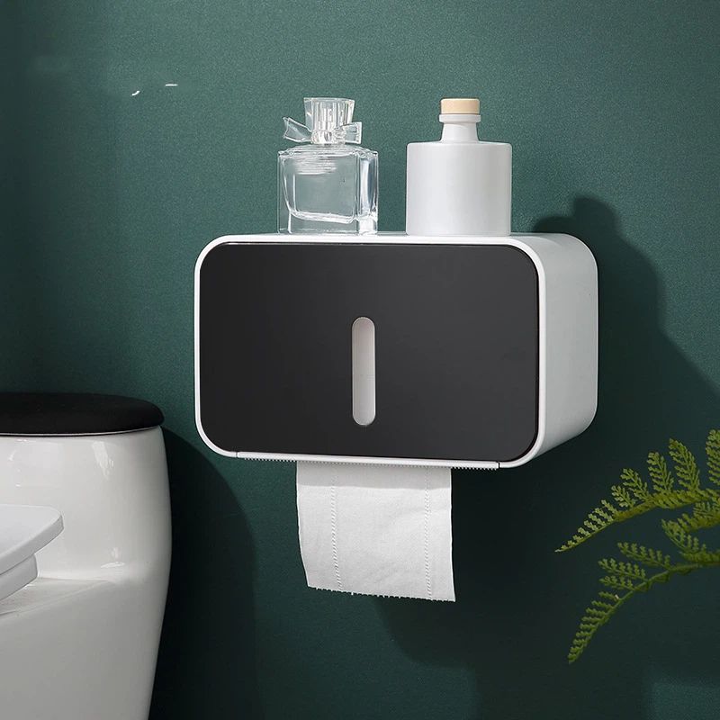 Adhesive sticker on the back plate of the enclosed toilet roll holder