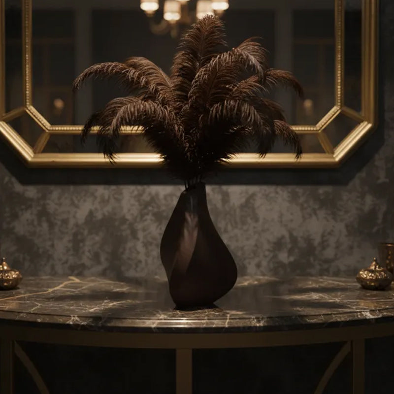 Sculptural black 3D printed vase with a contemplative form