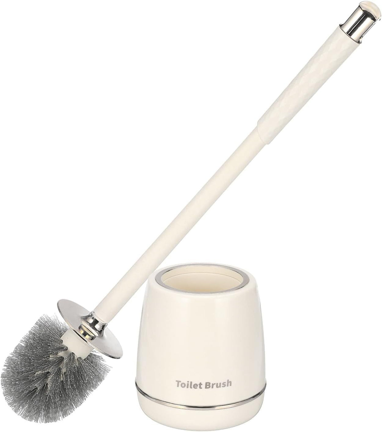 Silver toilet brush and holder set standing beside a toilet
