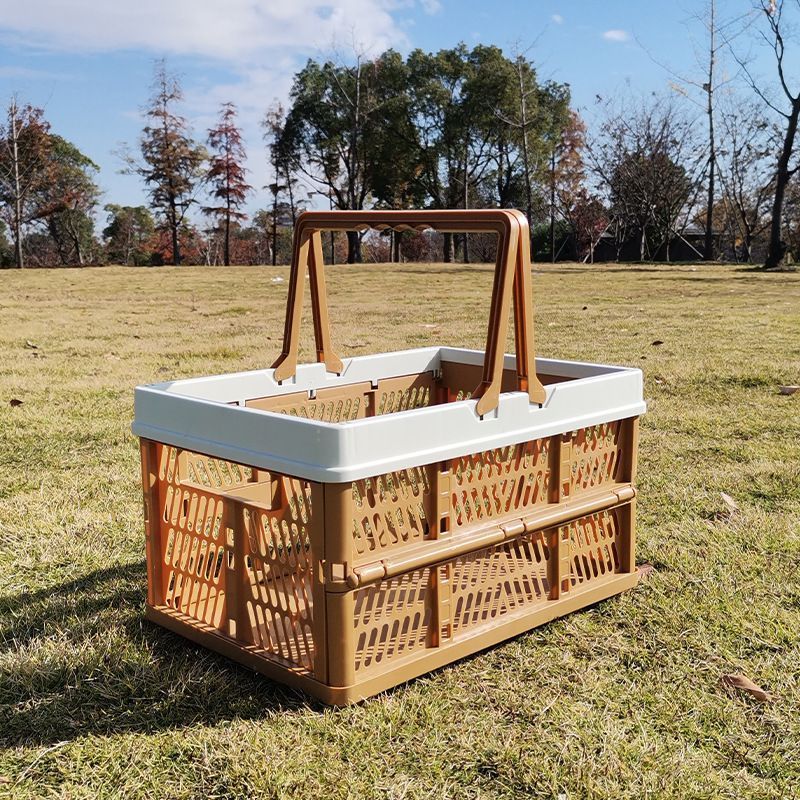 Eymet ventilated foldable picnic basket in brown with beige carry handle