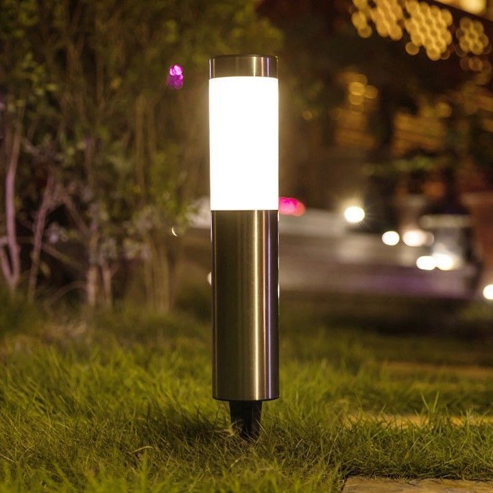 Silver solar stake light installed on lawn