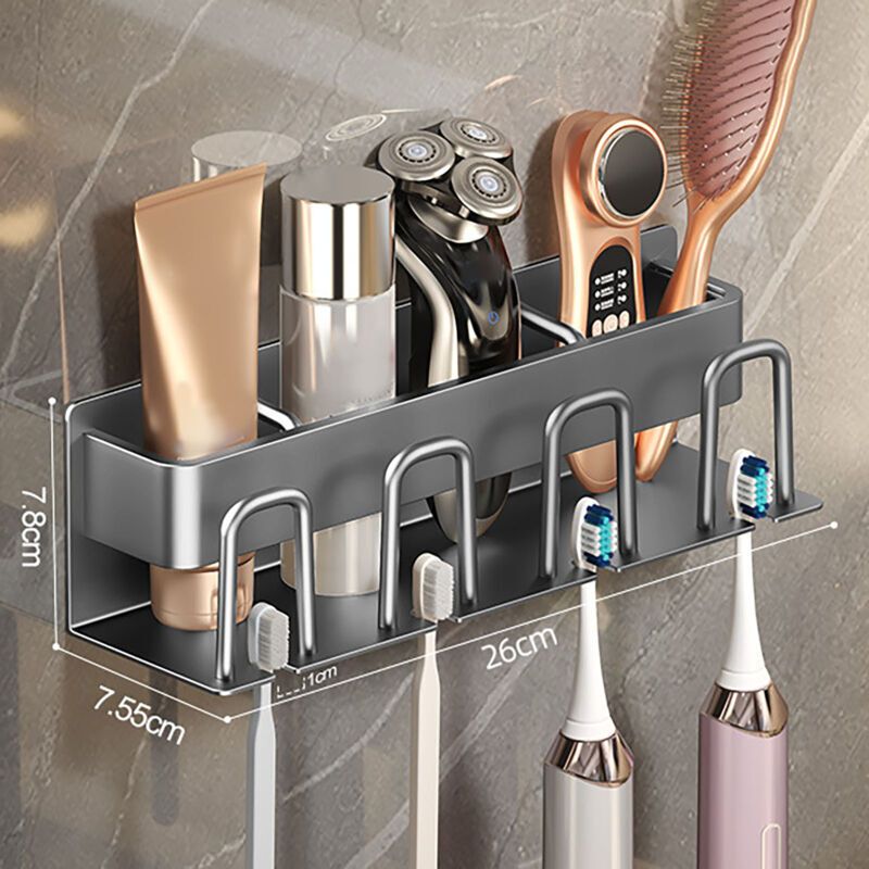 Grey aluminium wall mounted electric toothbrush holder with four cups above a bathroom basin