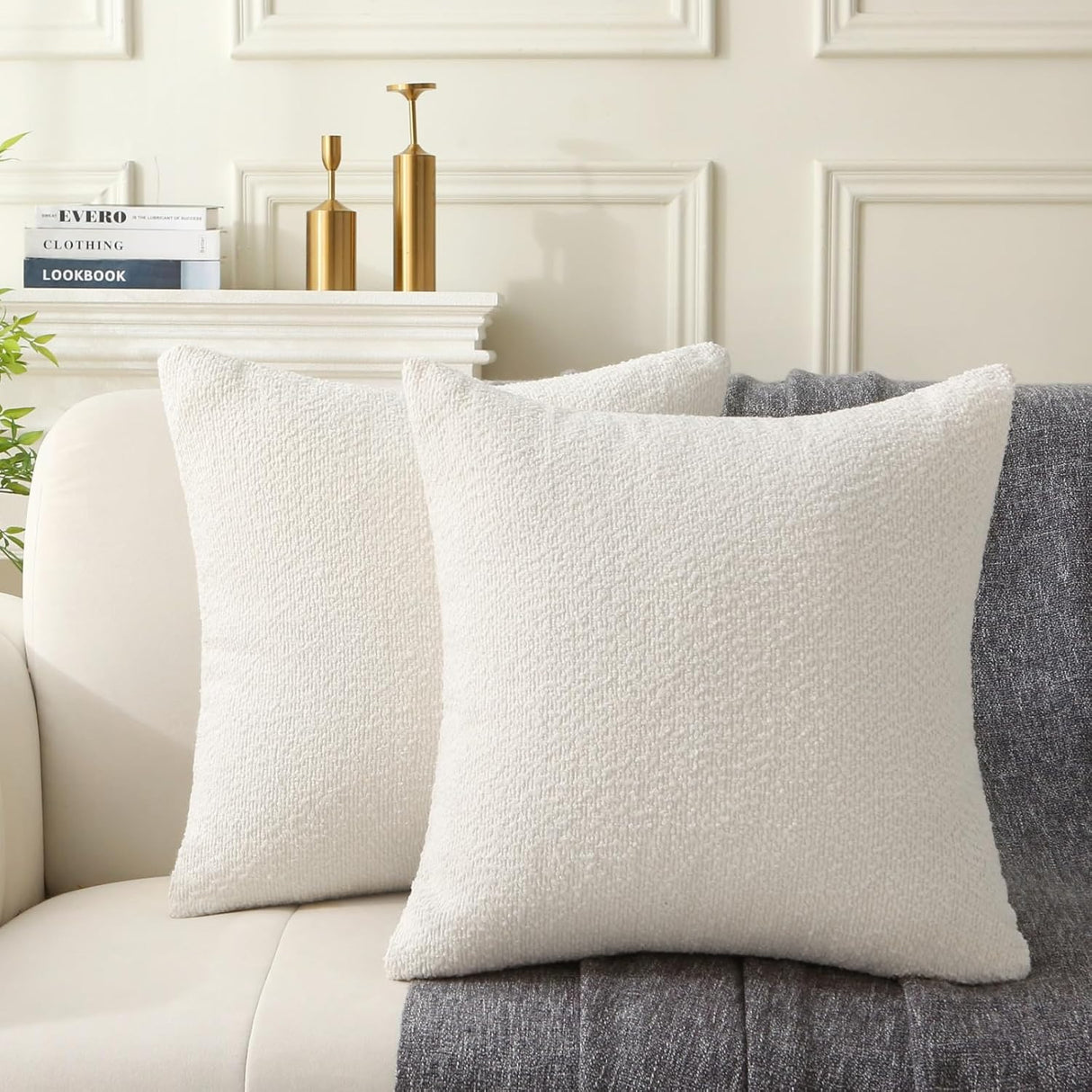 Hamilton white boucle textured square throw cushions set of two on a sofa