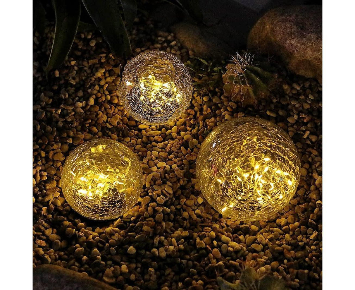 Solar crack glass ball garden light glowing warm white