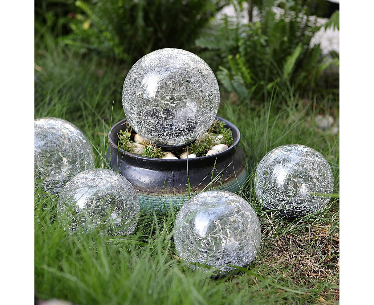 Solar crack glass ball garden light glowing warm white