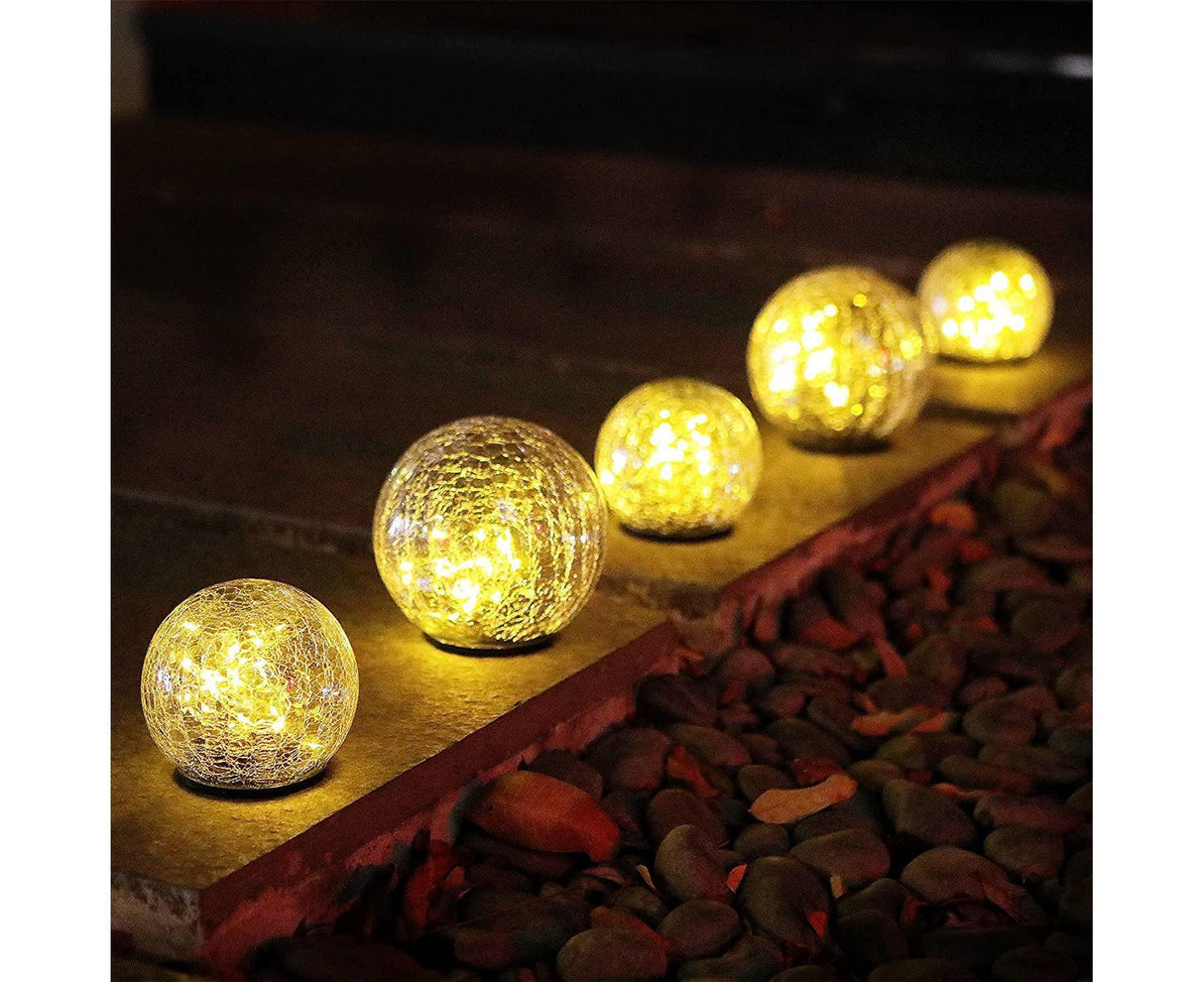 Solar crack glass ball garden light glowing warm white