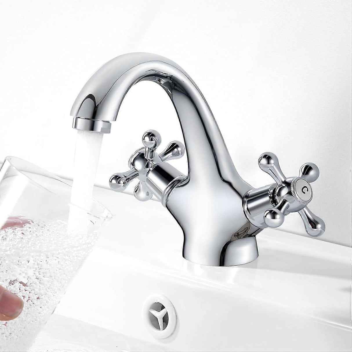 Side view of the retro chrome basin tap showing curved spout