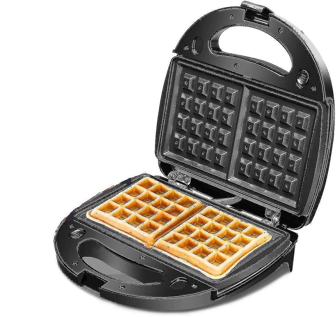 Waffle maker opened showing non stick waffle cooking plates