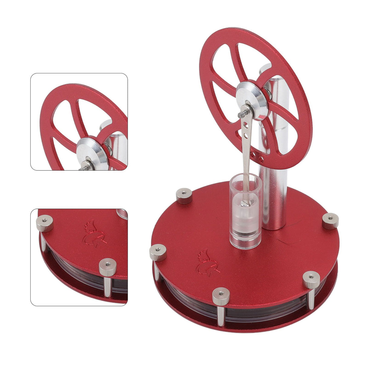 Red Stirling engine model displayed on a desk
