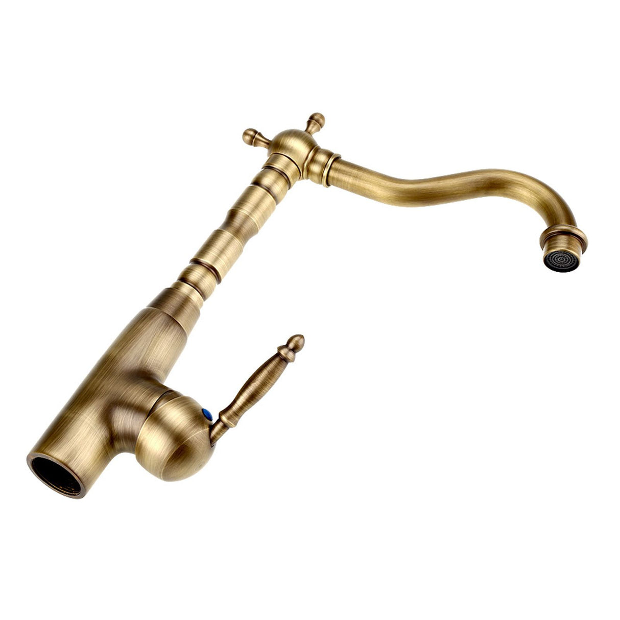 Water running from the spout of the yellow bronze basin mixer tap