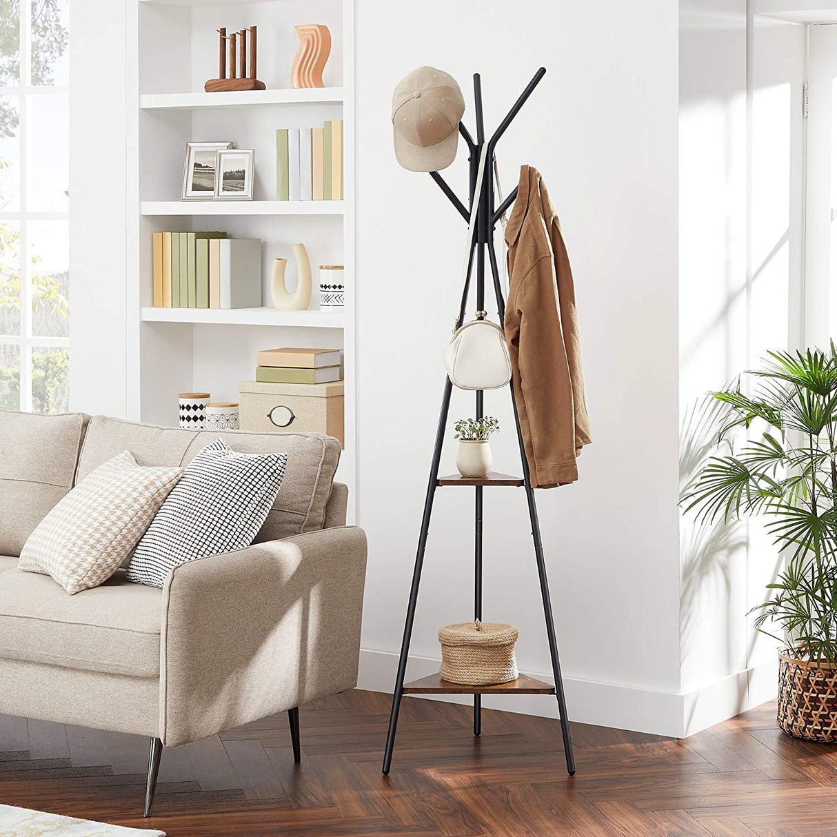 Black industrial coat rack stand with two shelves