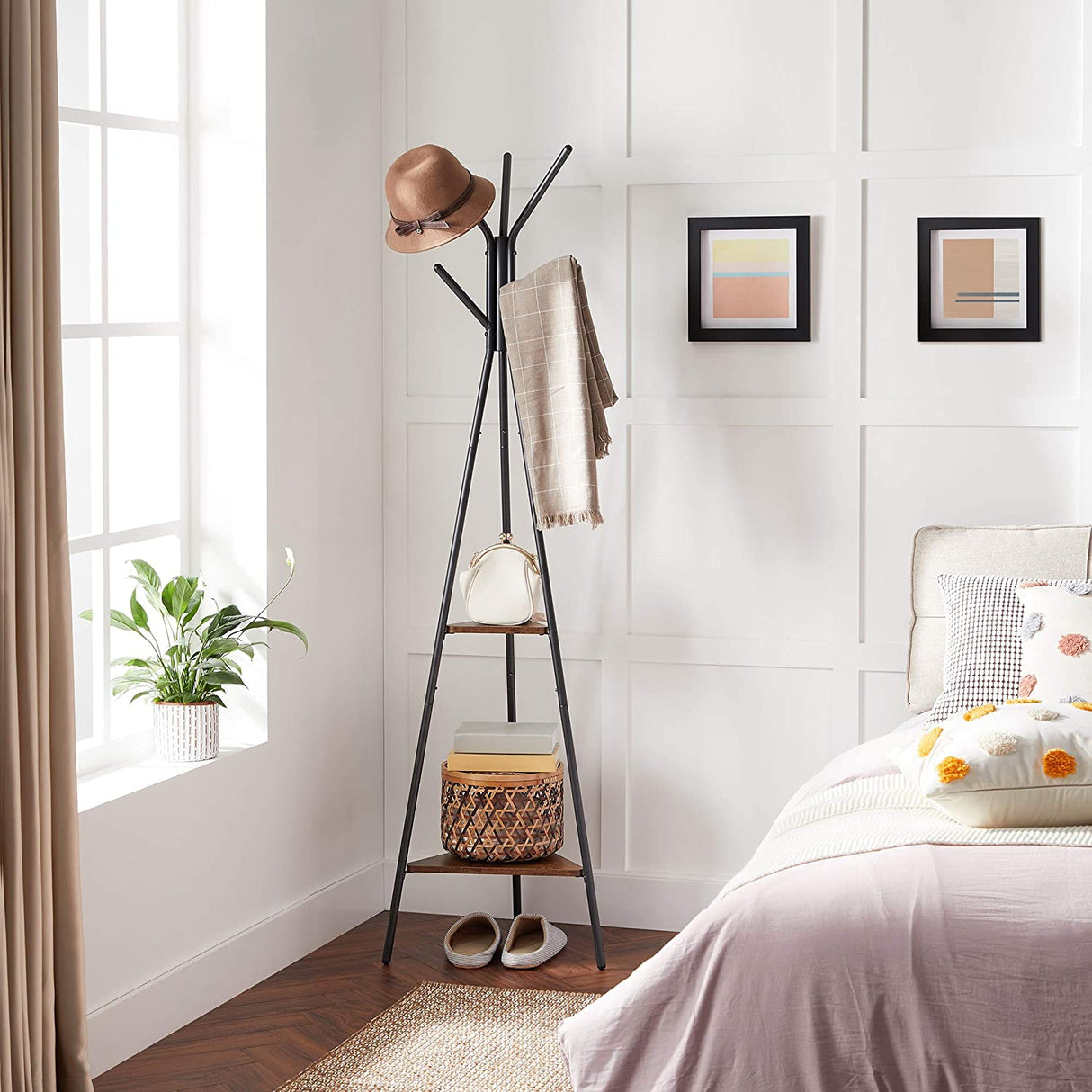 Black industrial coat rack stand with two shelves