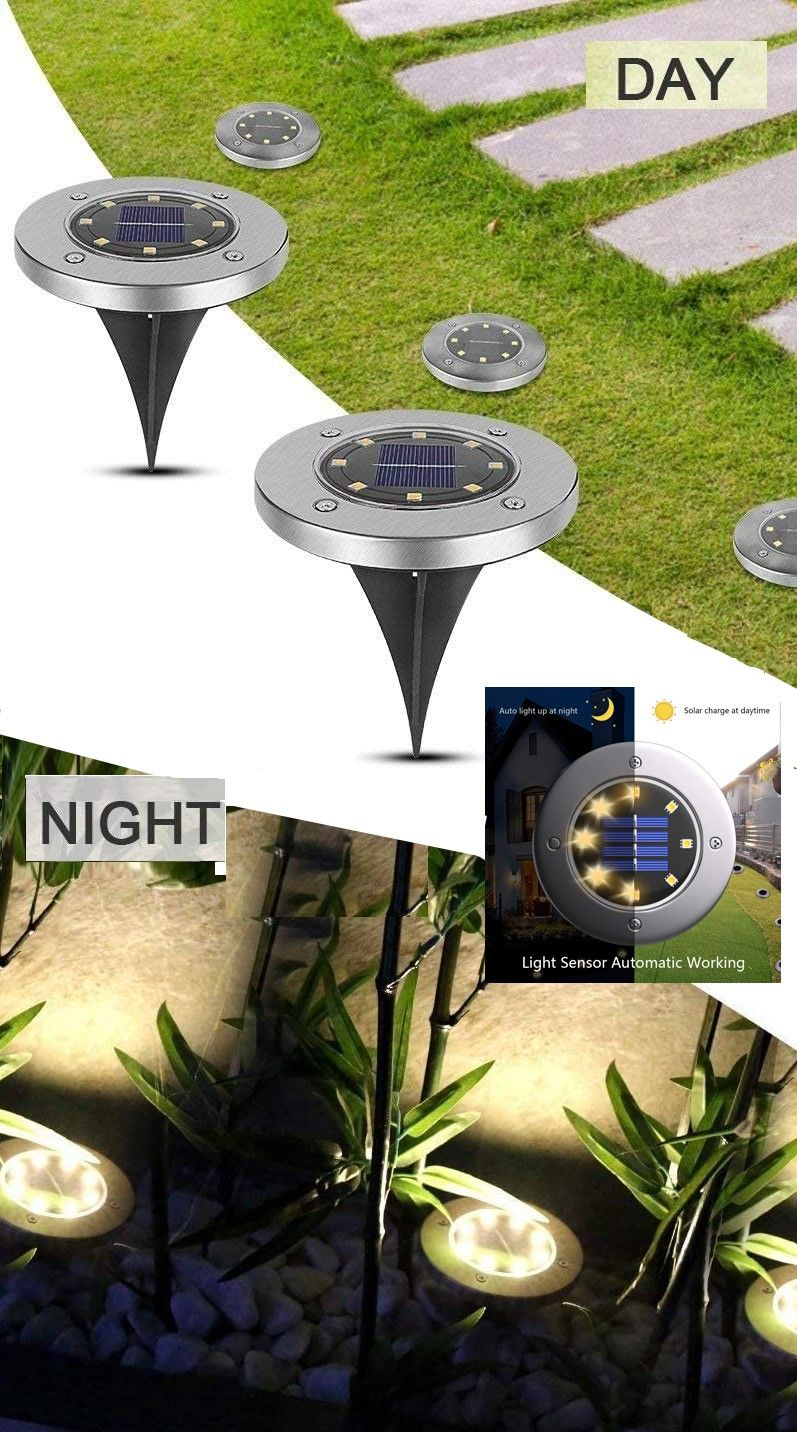 Solar pathway light with warm white 8 LED glow in a garden