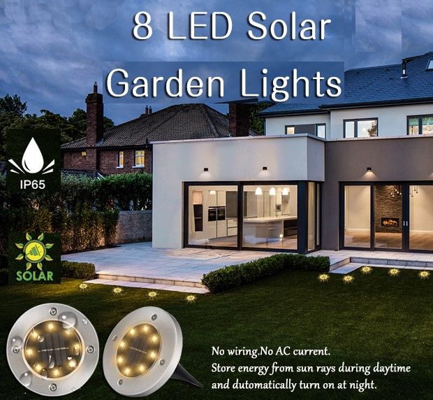 Solar pathway light with warm white 8 LED glow in a garden
