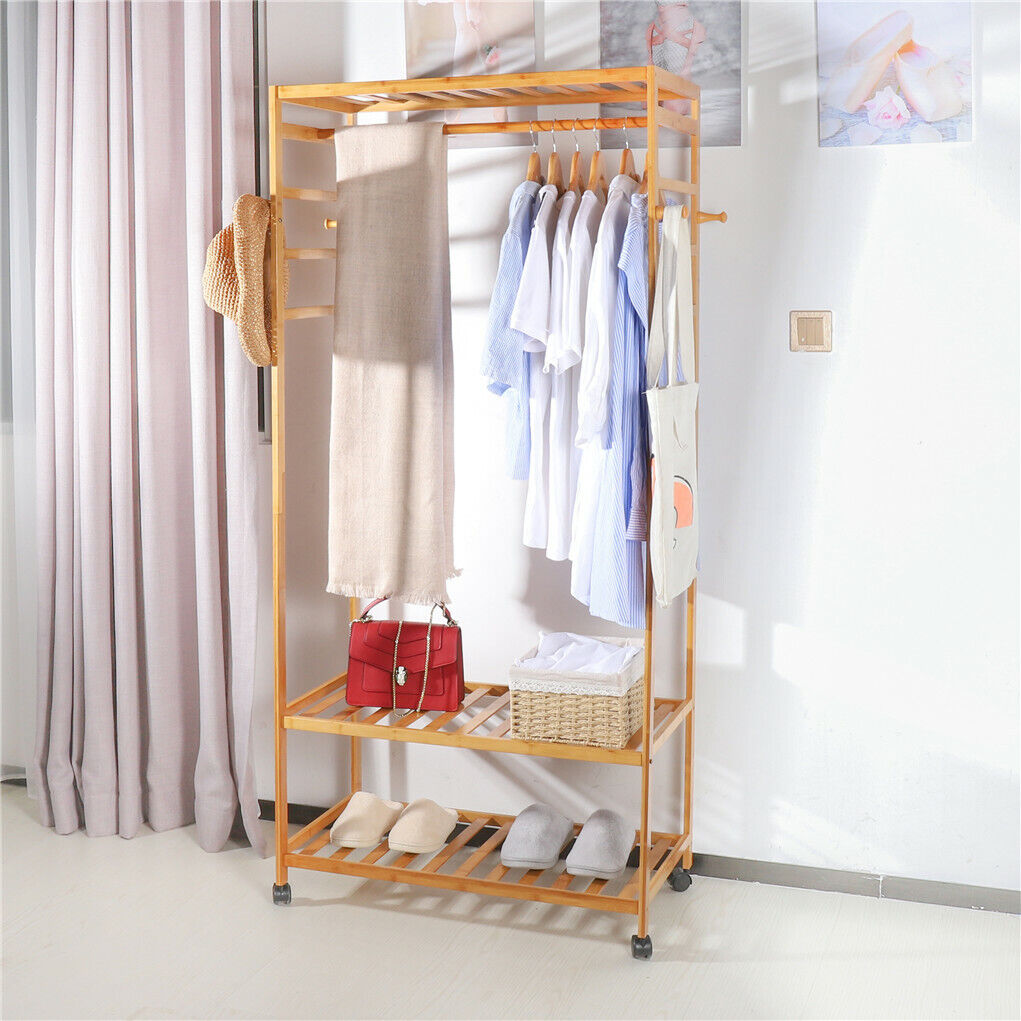 Three tier bamboo rolling clothes rack with hooks