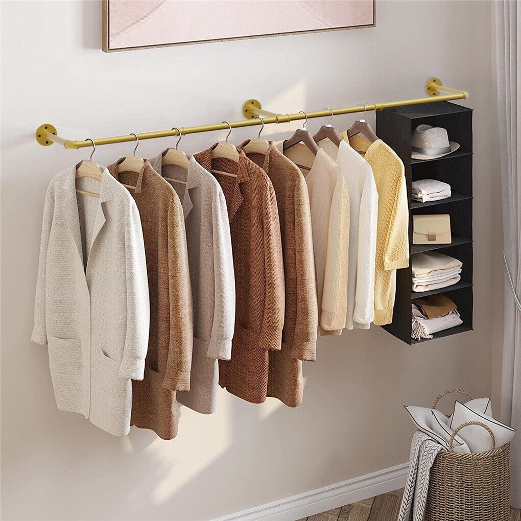 Gold wall mounted clothes rail in vintage iron