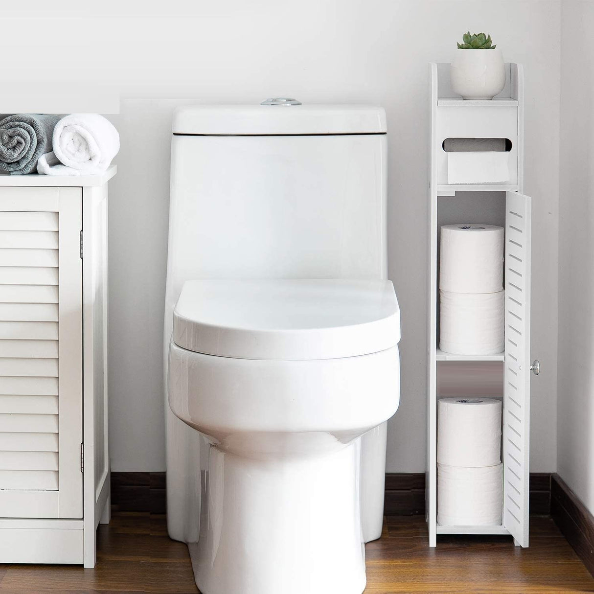 Front spindle dispensing a toilet roll on the white stand