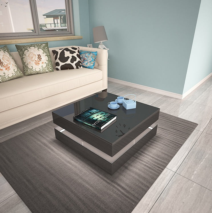 Acheron black high gloss coffee table in a modern living room