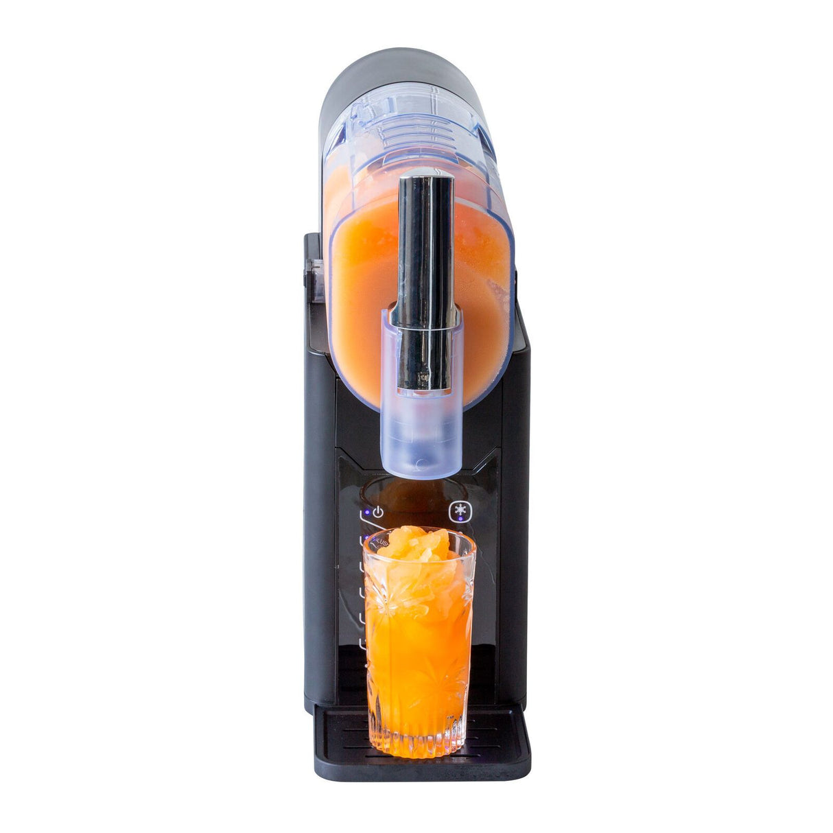 Frozen slushie being poured from the machine into a tall glass