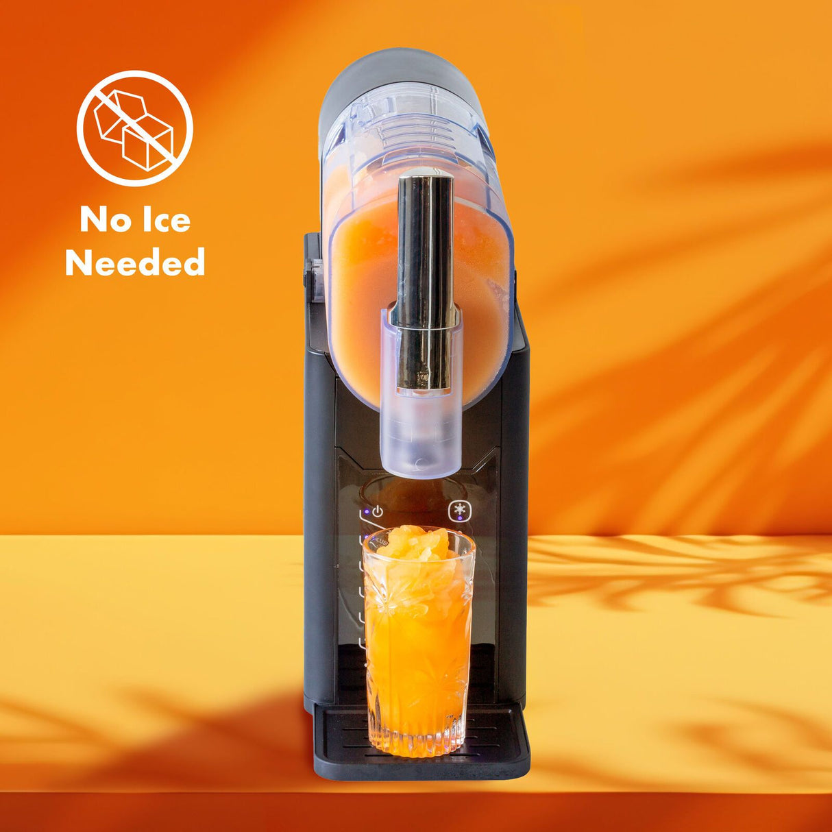 Slushie maker on a kitchen bench with frozen cocktails served alongside