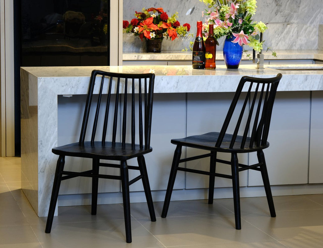 Dorrien black solid oak dining chair in a modern dining room