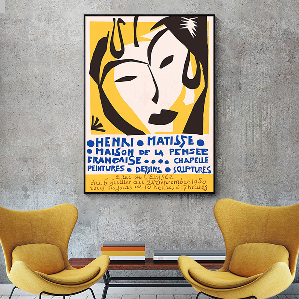 Black framed Matisse canvas print styled on a neutral interior wall
