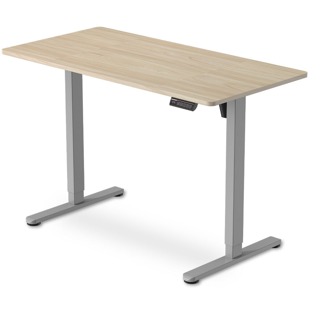 Chapman light oak standing desk in a home office
