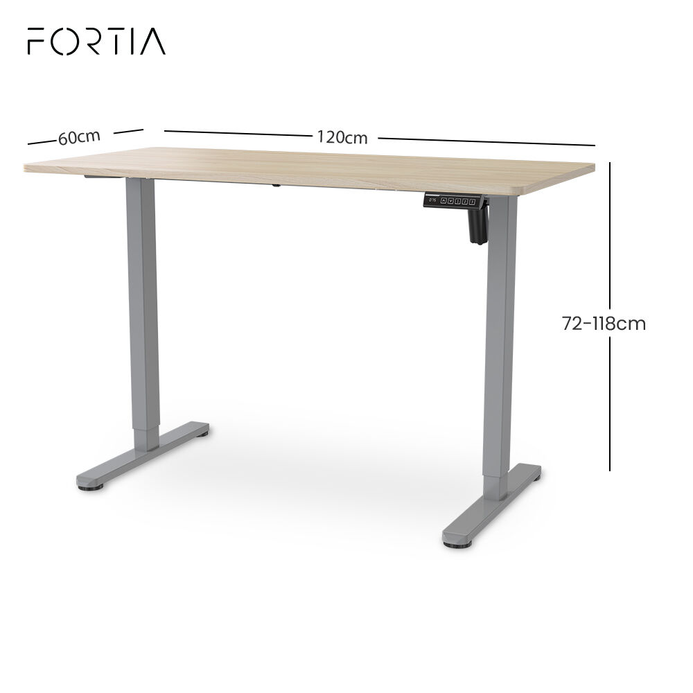 Chapman light oak standing desk in a home office