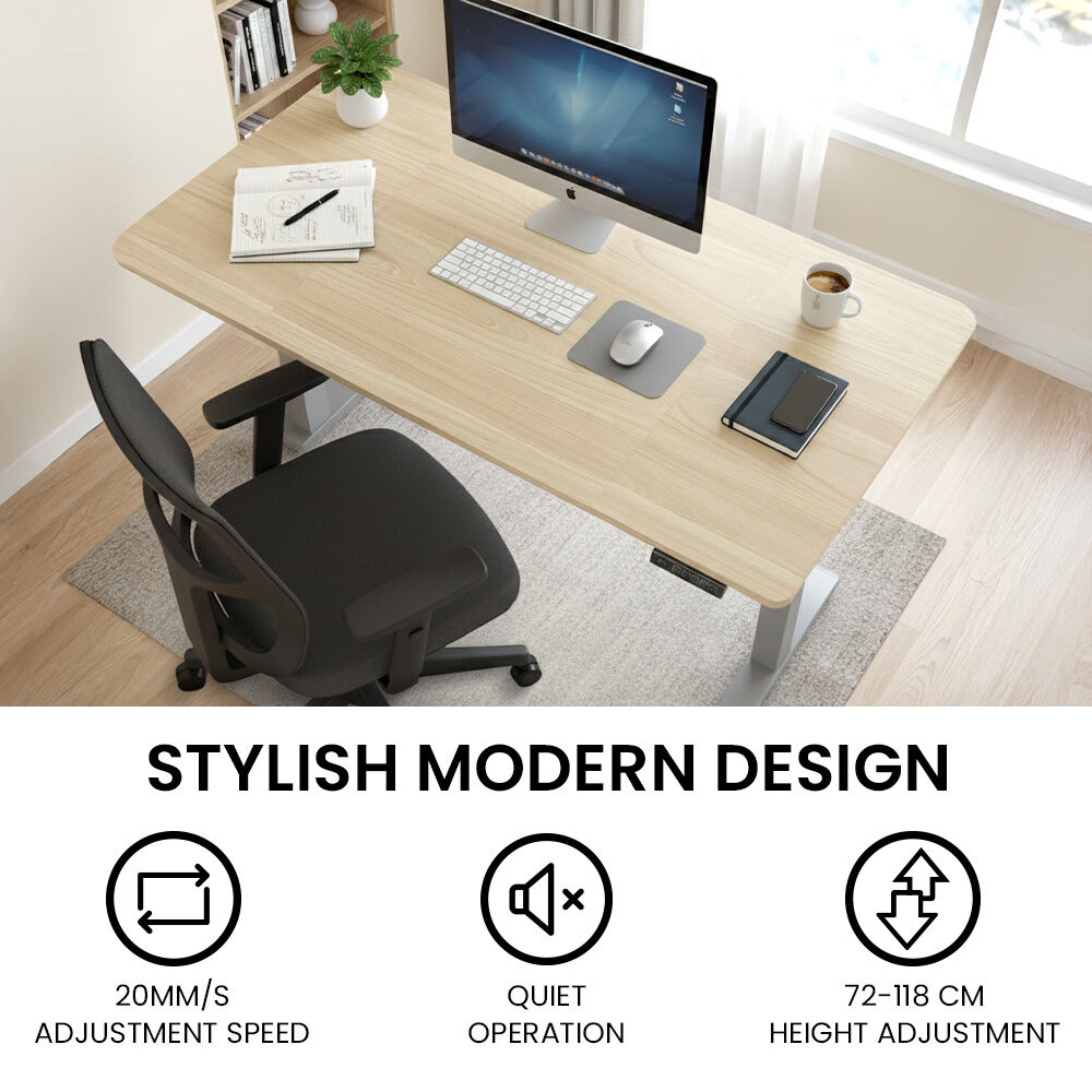 Chapman light oak standing desk in a home office