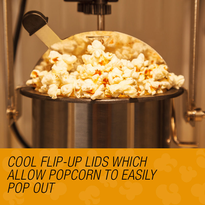 Popcorn machine on a bench with a bowl of freshly popped popcorn