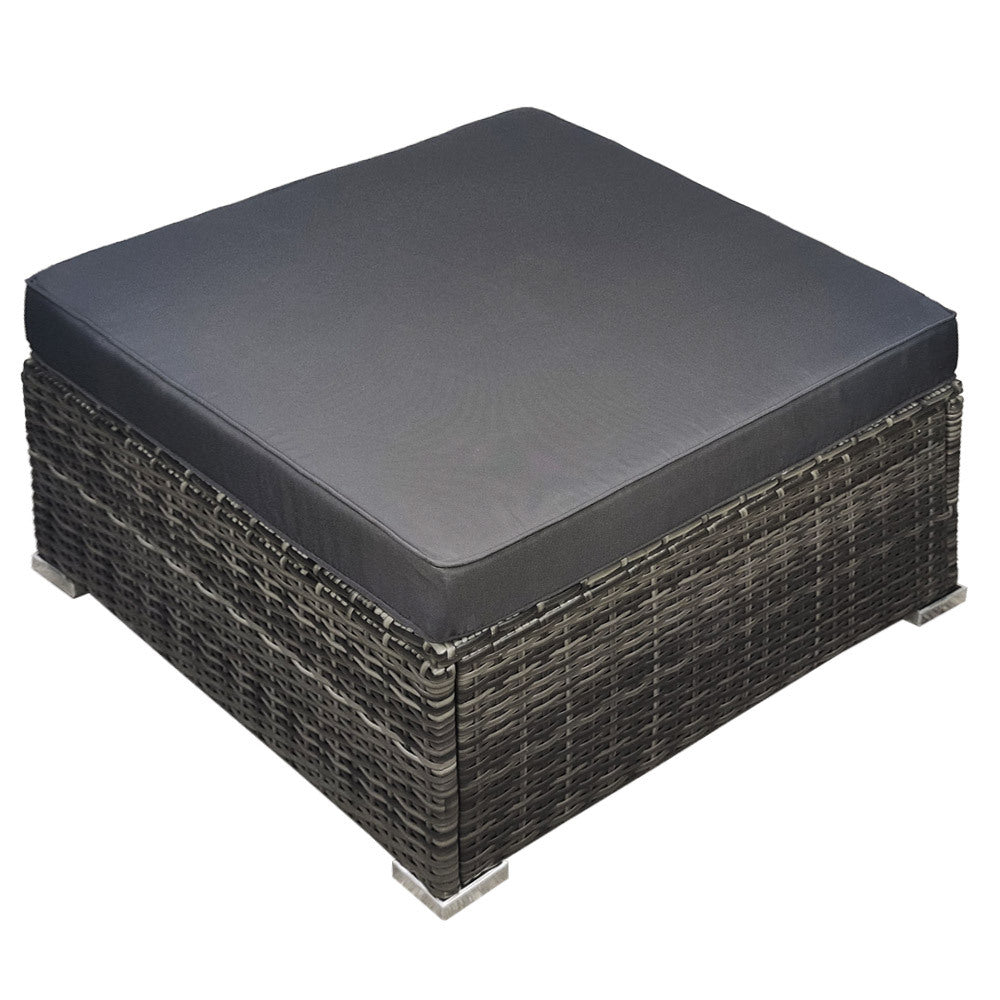 Sarina grey wicker outdoor modular ottoman in an outdoor setting