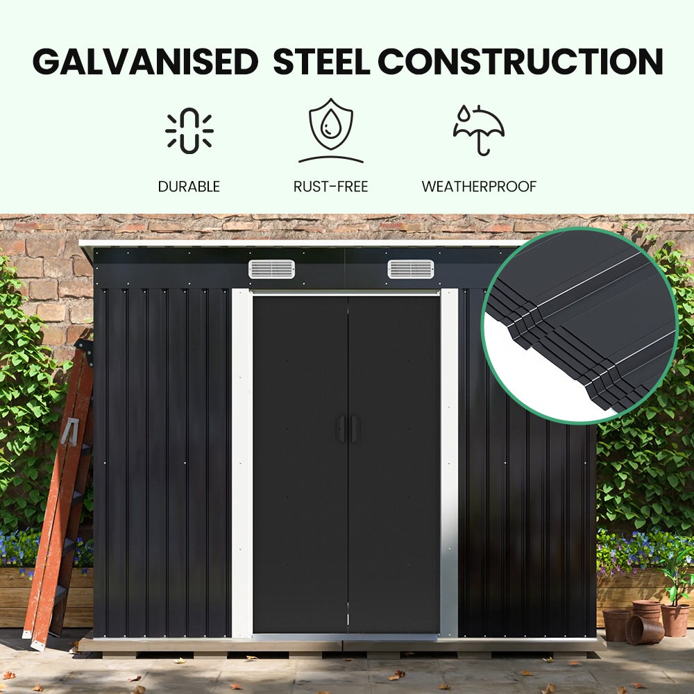 Steel garden shed with sliding doors open showing interior