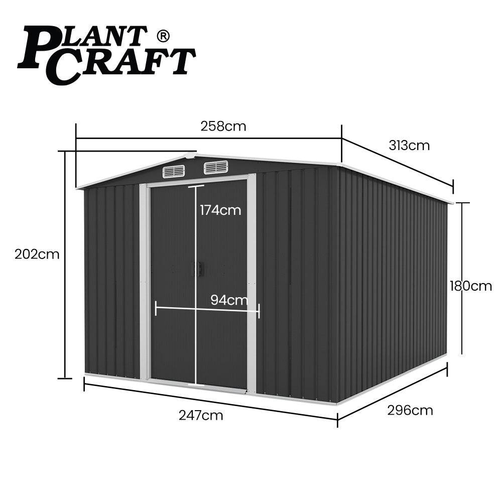 Steel garden shed with sliding doors open showing interior