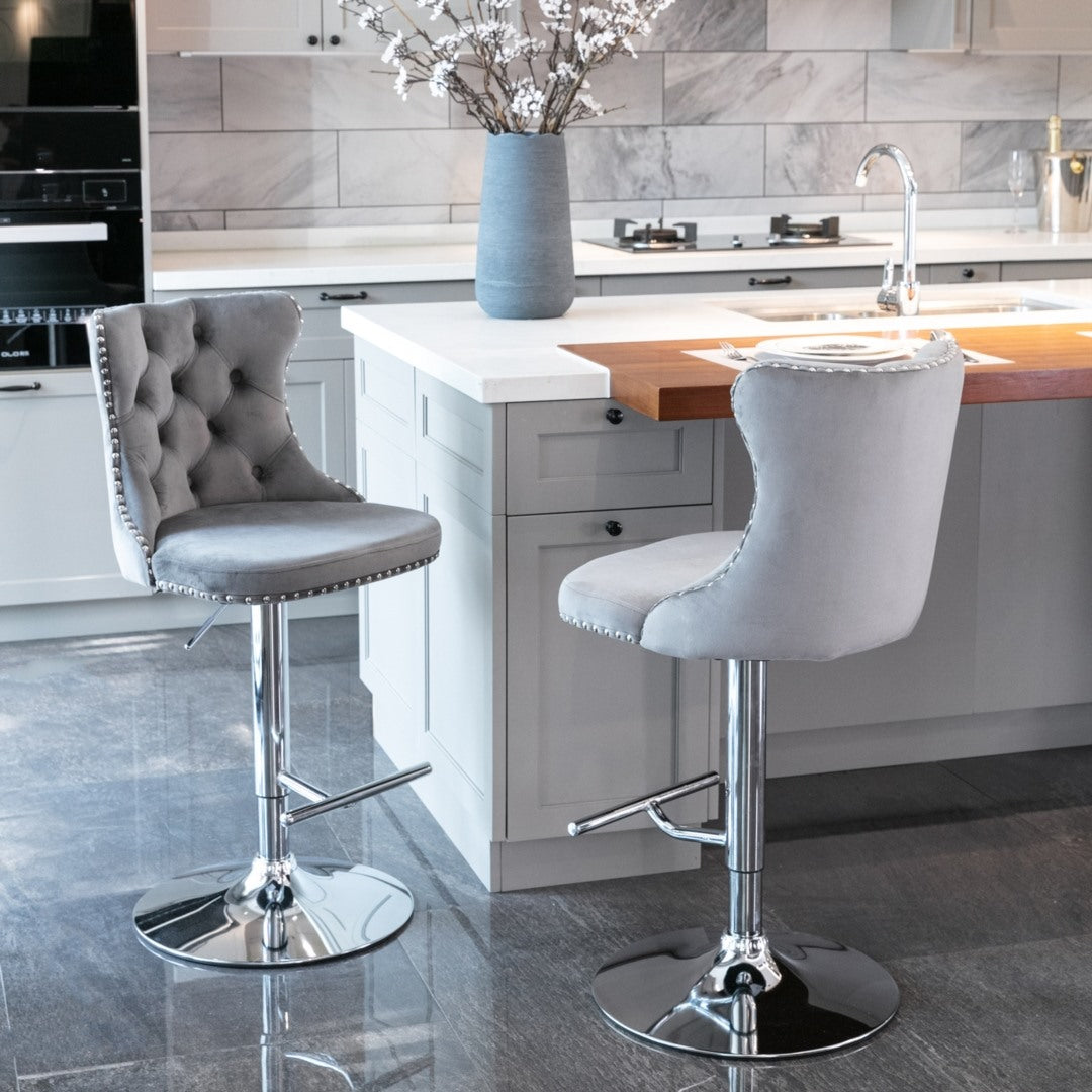 Pair of studded velvet bar stools at kitchen counter — Allure Home Collections