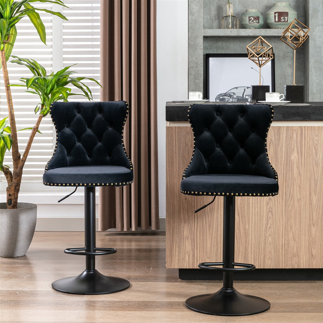 Kilcunda black velvet tufted swivel bar stool with nailhead trim in a modern kitchen