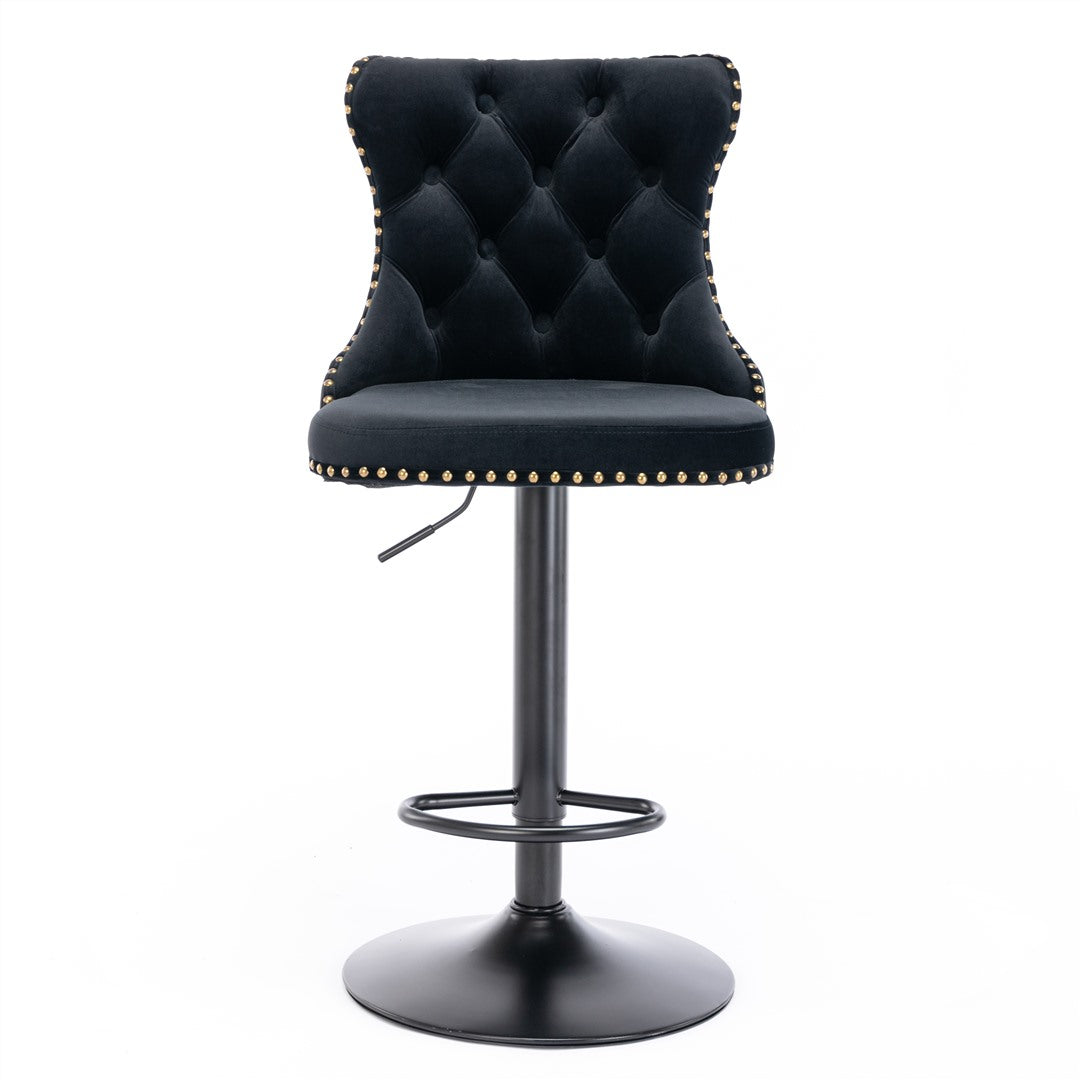 Kilcunda black velvet tufted swivel bar stool with nailhead trim in a modern kitchen