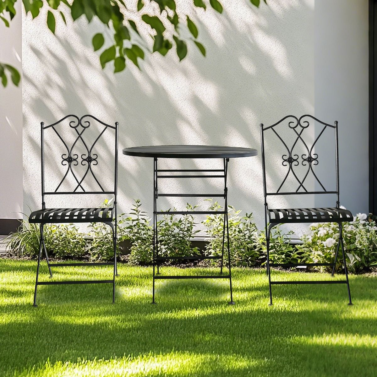 3 piece black iron outdoor bistro set with round folding table and two chairs