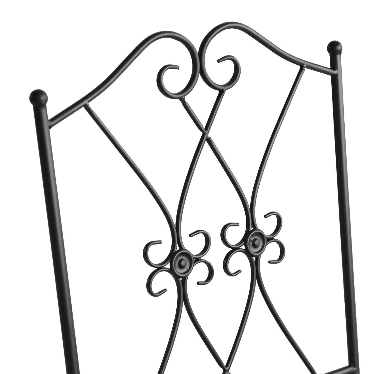 Black iron folding bistro set arranged on a patio