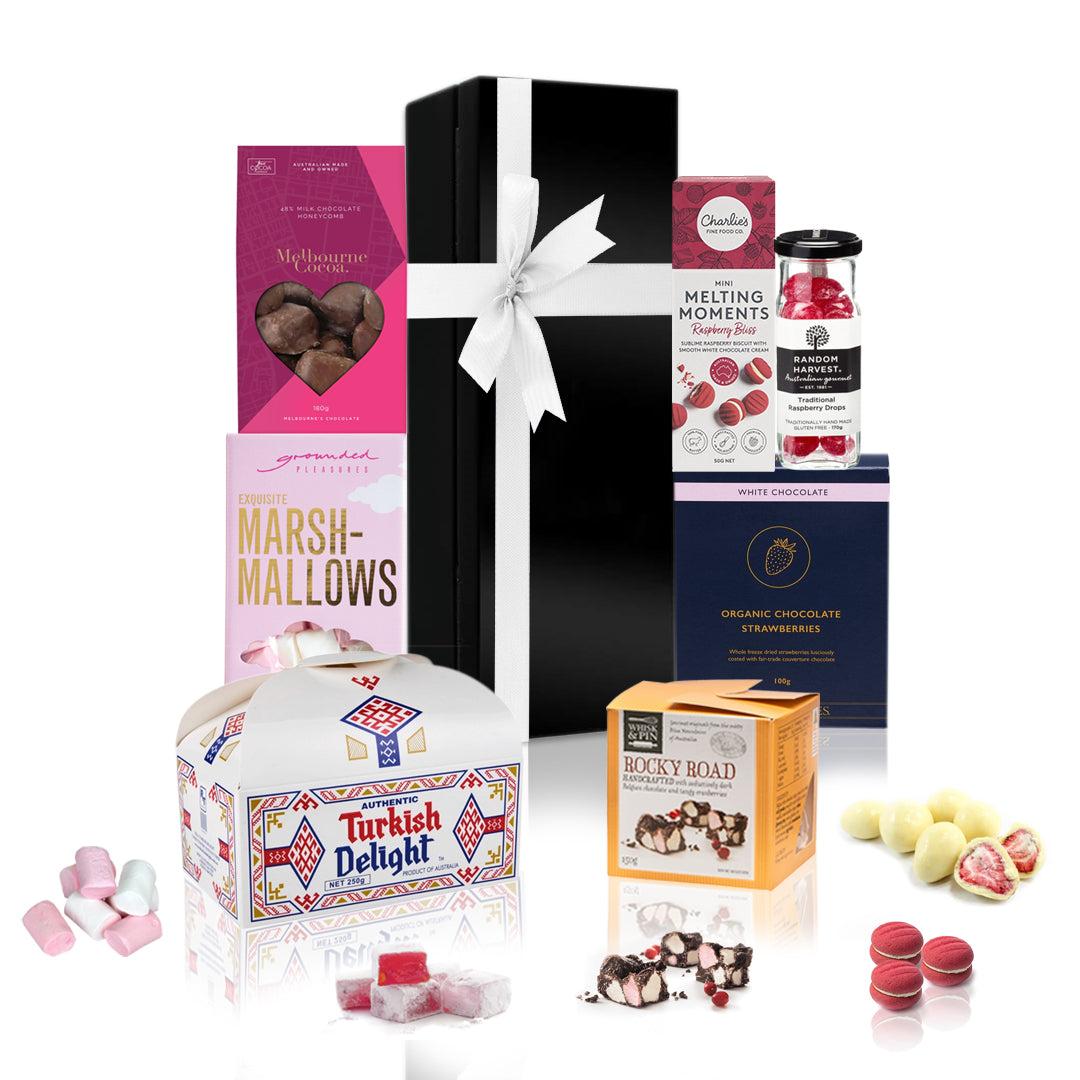 Australian Sweetness Gift Hamper filled with chocolates and sweets in a black box with a white bow