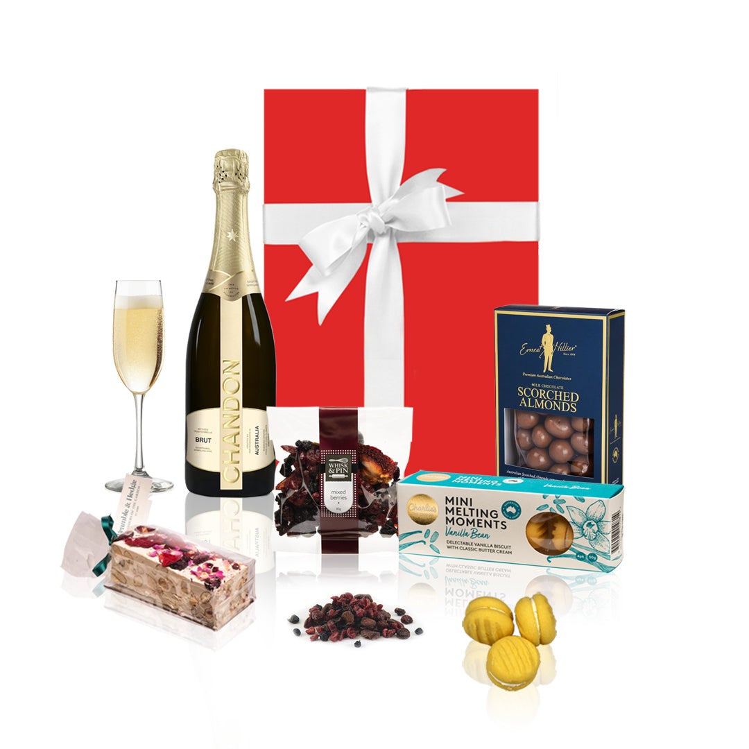 Champagne and Sweets Gift Hamper in a red box with a white bow