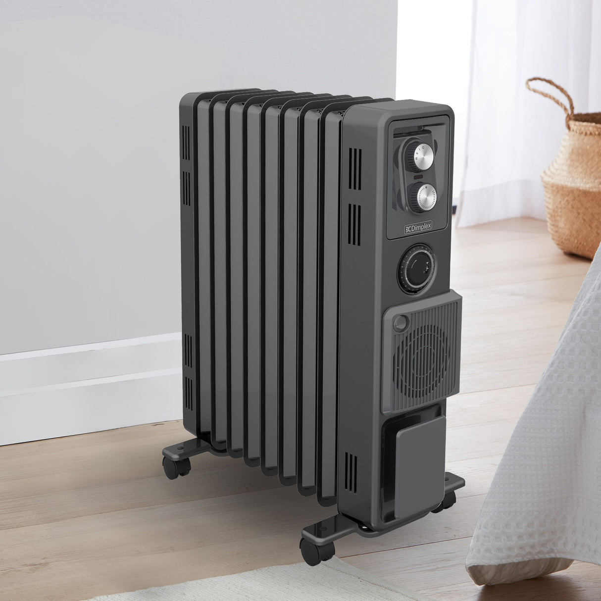 Oil free column heater placed in a living room setting