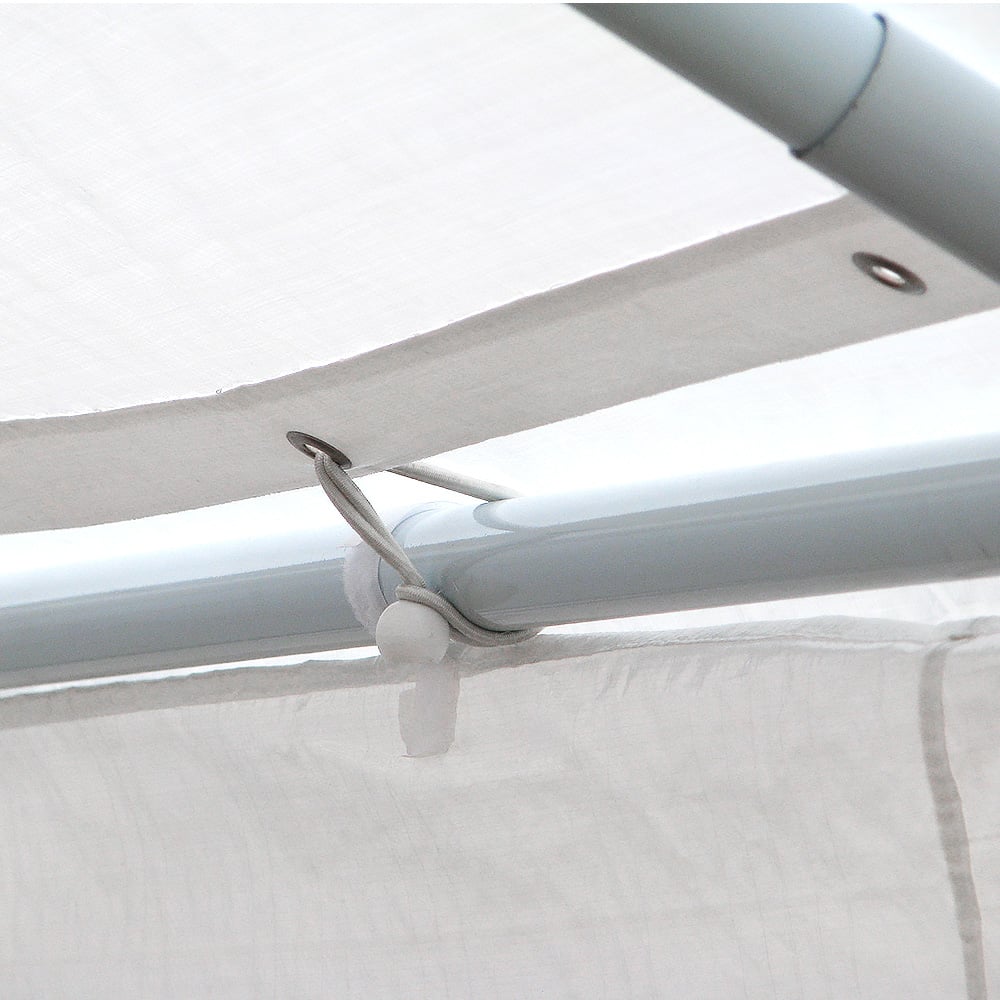 Interior of the white 4 x 8 m marquee showing the steel frame and roof lining