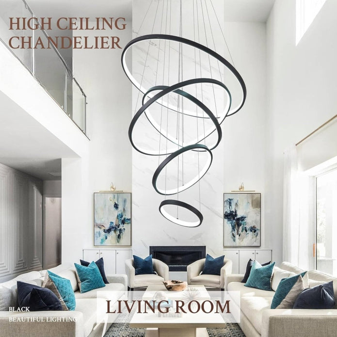 Black ring chandelier illuminated with warm light