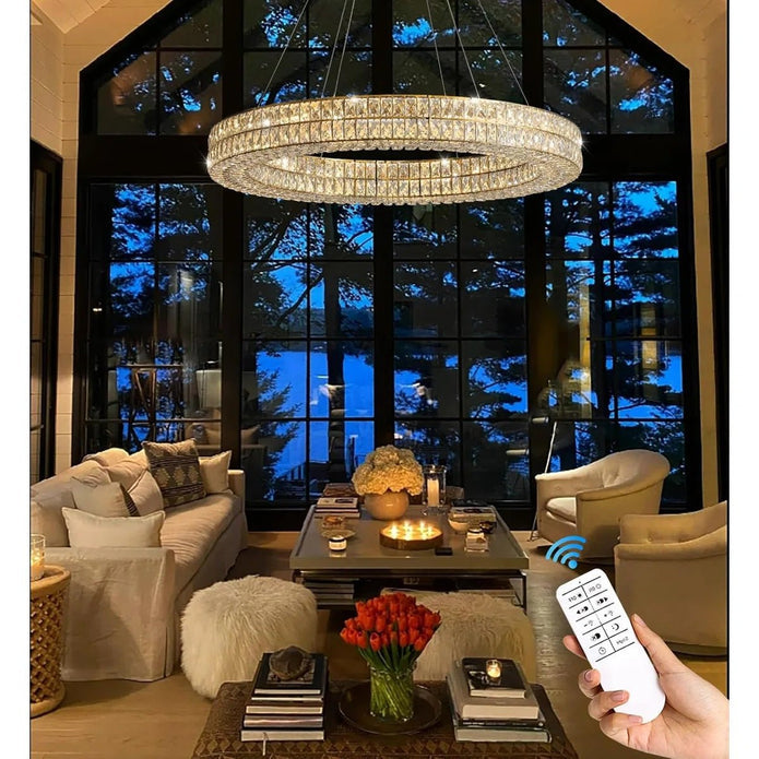 Gold crystal ring chandelier illuminated in a living room
